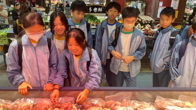 Buying ingredients to cook for the class